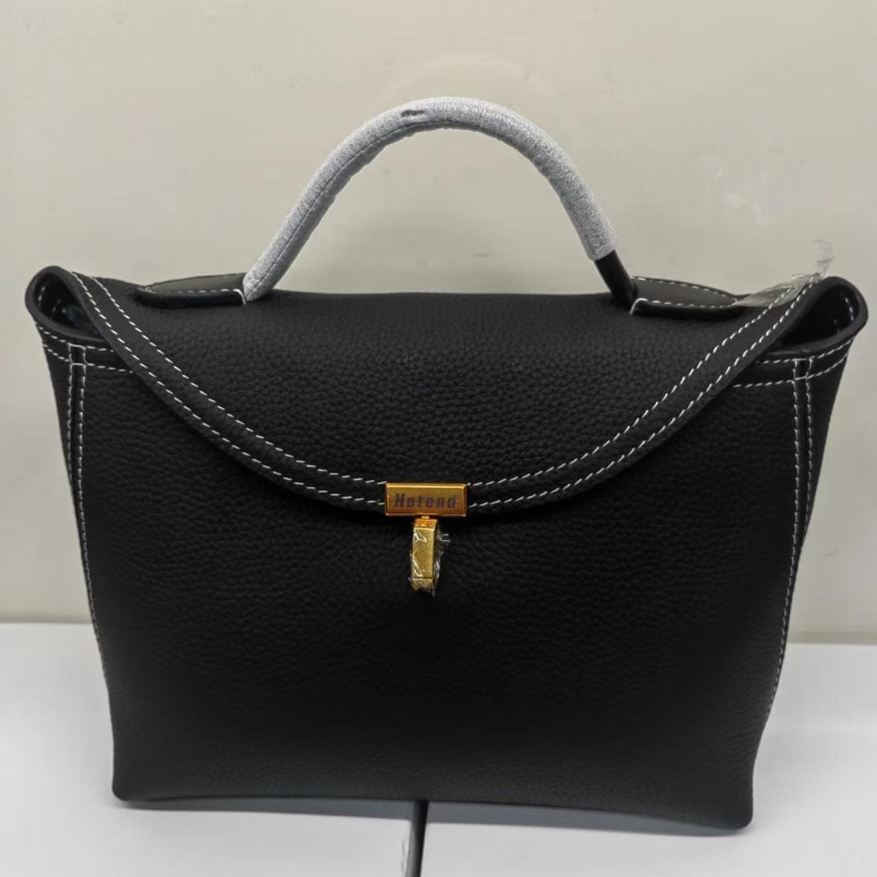 Hotend Solid color cowhide buckle bag-Black